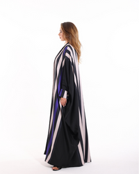 Stripe Studio Bisht from Esme Abaya Summer '26 collection highlighting a stylish layered design with luxurious finishing.