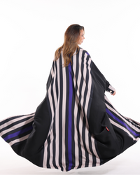 Luxury Stripe Studio Bisht from Esme Abaya Summer '26 collection designed with a graceful silhouette and contemporary elegance.