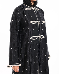 Full-length view of The Bow Theory Abaya showcasing premium soft Turkish fabric, graceful drape, and sophisticated modest fashion.