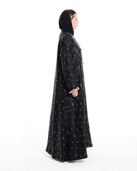 Matching sheila with elegant white piping styled with The Bow Theory Abaya from Esmeabaya Summer '26 Collection.